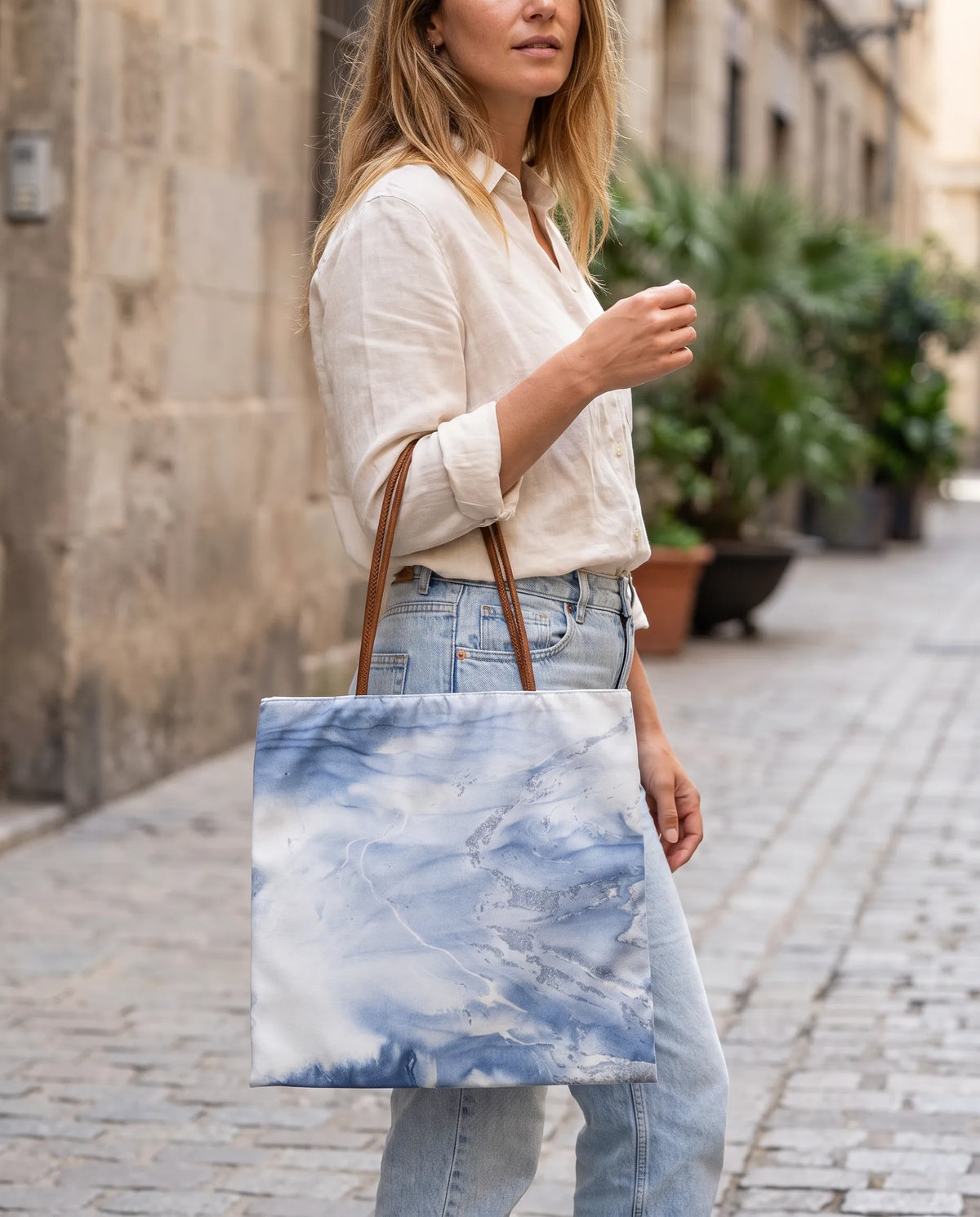 Indigo Sea marbled canvas tote bag with blue, ivory, and silver pattern