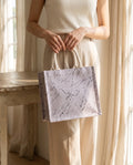 Marble tote bag classic marble held indoors
