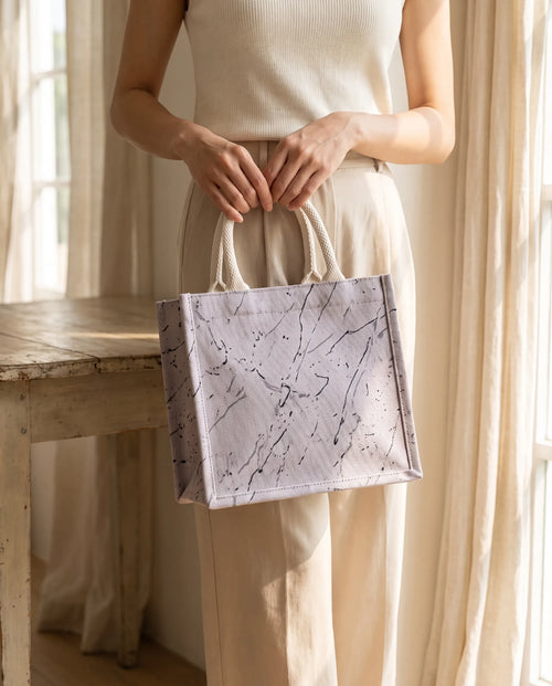 Marble tote bag classic marble held indoors